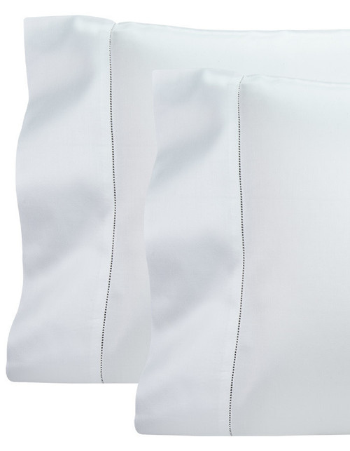 Our Mia Luxury Pillowcases are finished with an elegant hemstitch. They are available in white and are woven and sewn in Italy from a 715 thread count cotton sateen. 